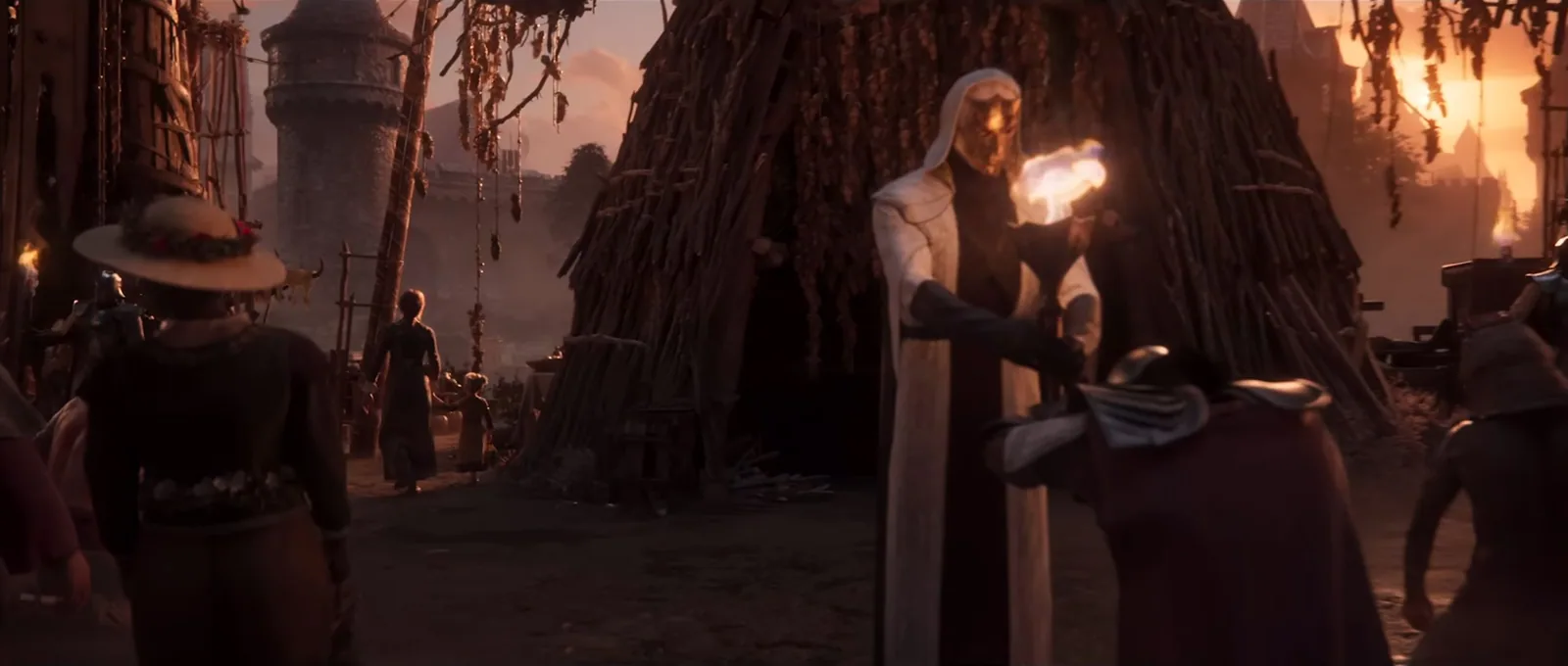 A torch, a masked figure and a large woven structure in the official Divinity trailer at 00:55.