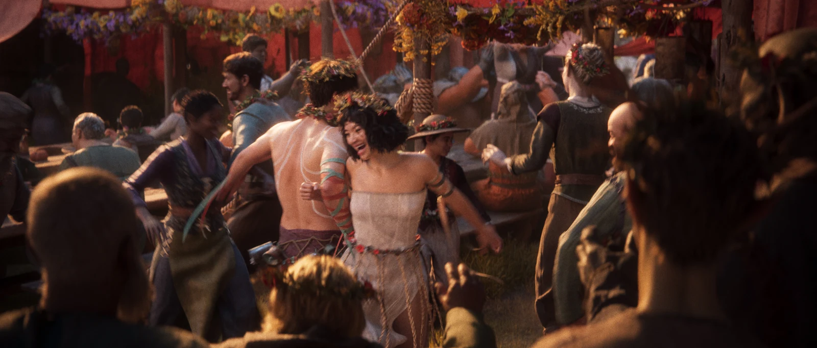 Dancing festival guests in the official Divinity cinematic.